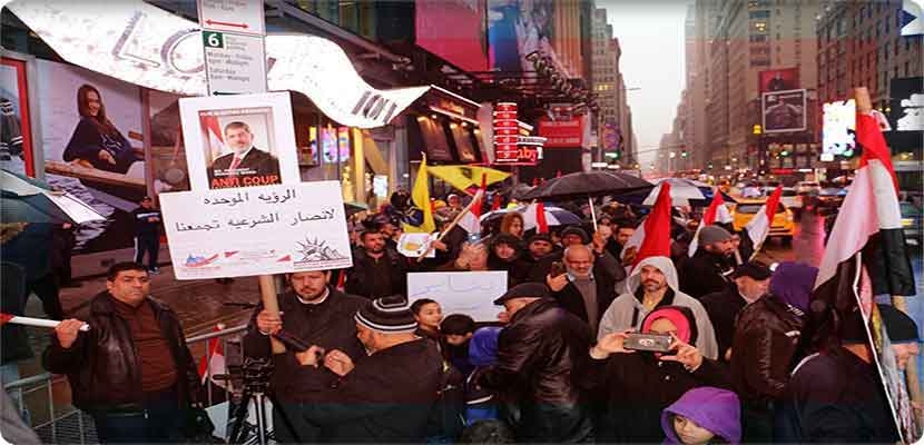 قيادات التنظيم في الولايات المتحدة الأمريكية في وقفات بساحة "تايمز سكوير" بمدينة نيويورك، للتحريض ضد الدولة المصرية قبل أيام من حلول الذكرى السادسة لثورة 25 يناير
